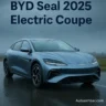BYD Seal 06 GT electric car parked in an urban setting with greenery in the background – Autoakhbar.com