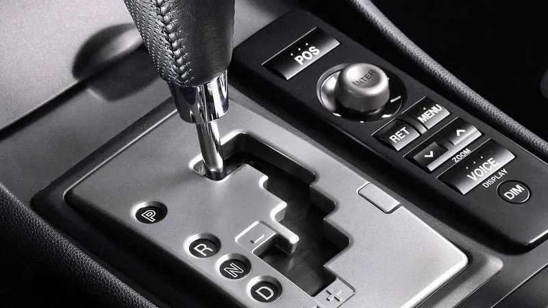 Close-up of AMT, CVT, and DCT gear levers in compact SUVs