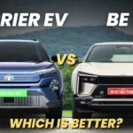 Front look of Tata Harrier EV vs Mahindra BE 6 side-by-side on road
