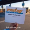 New Fastag Annual Pass 2025 – Car crossing highway toll plaza with RFID scanner.