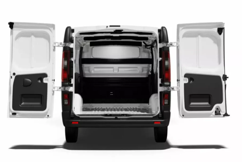 Renault Trafic E-Tech Electric van showcased with AutoAkhbar branding and bold headline design