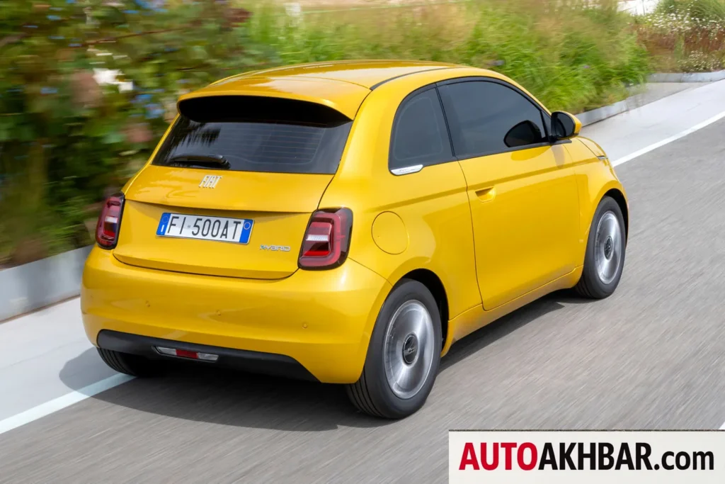 A modern hybrid car showcased outdoors with clean design, used for automotive review on AutoAkhbar.com