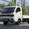 Euler Turbo EV 1000 cargo electric vehicle in white color with pricing and range details displayed – AutoAkhbar.com