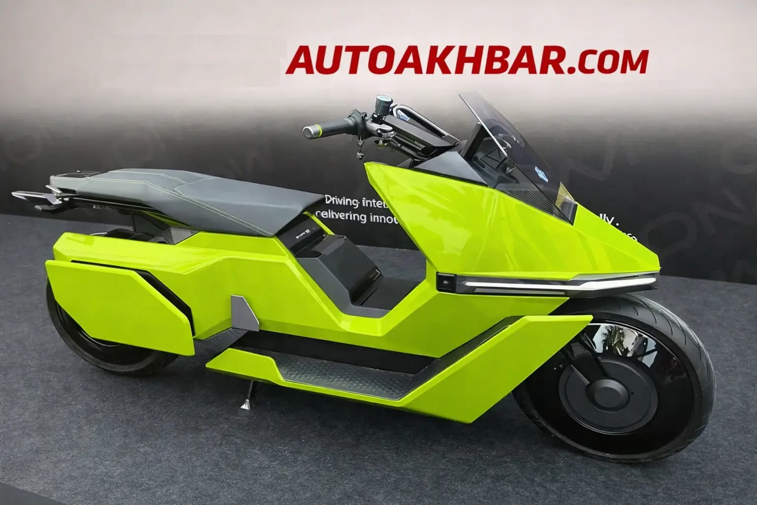 Omoway Omo X futuristic electric motorcycle in neon green with Autoakhbar branding