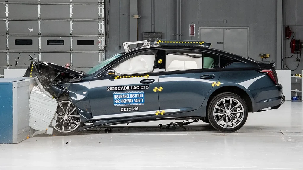 2026 Cadillac CT5 luxury sedan side profile in crash test facility