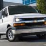 2027 Chevrolet Express van exterior shot, AutoAkhbar.com branded image