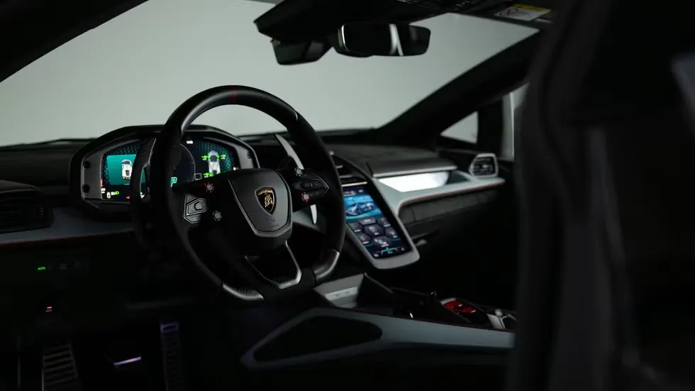 2027 Lamborghini Revuelto SV supercar on a race track, AutoAkhbar branded image