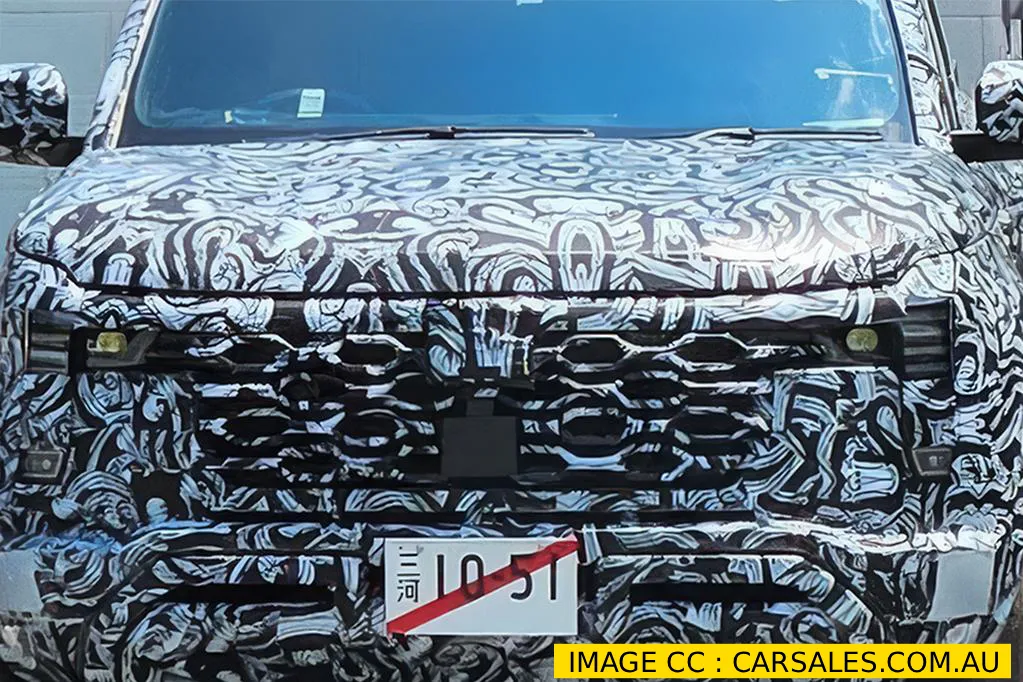 2027 Mitsubishi Pajero SUV on a rocky off-road trail