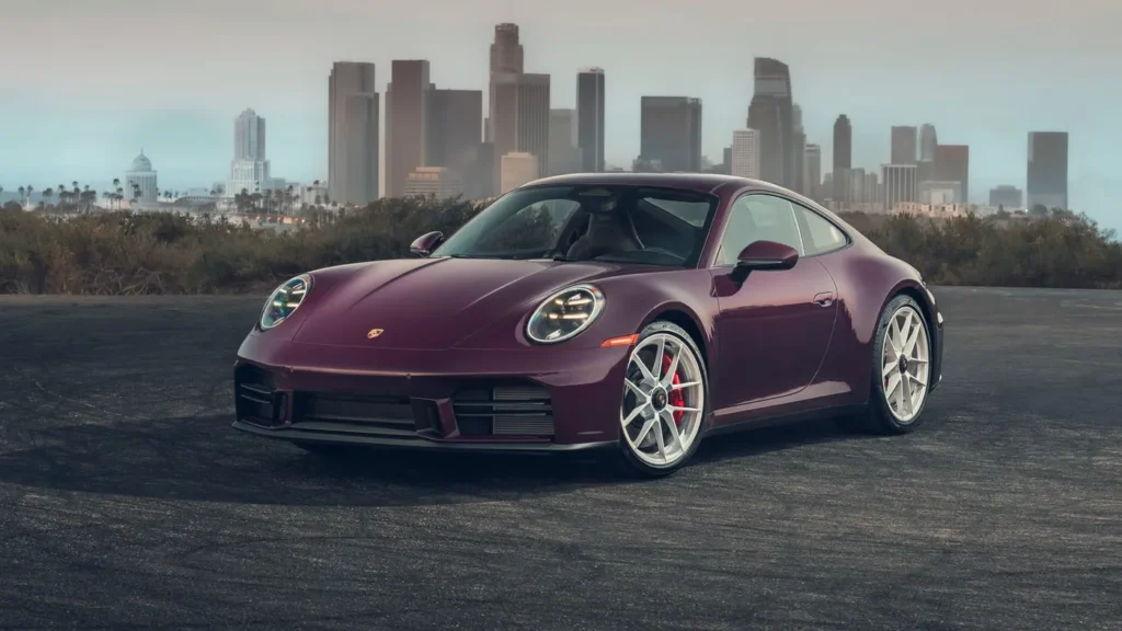 2027 Porsche 911 Carrera S with manual MT Package driving on a mountain road