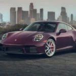 2027 Porsche 911 Carrera S with manual MT Package driving on a mountain road