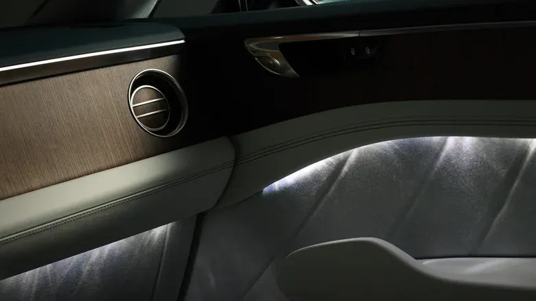 Bentley Torcal EV interior with Merino wool upholstery and Ombre wood trim, AutoAkhbar branded image