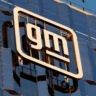 NHTSA Opens Fresh Probe : Chevrolet Silverado-style pickup with hood open during engine inspection amid GM V8 recall investigation