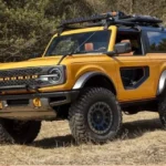 Ford Bronco-style ute concept driving on an outback dirt trail