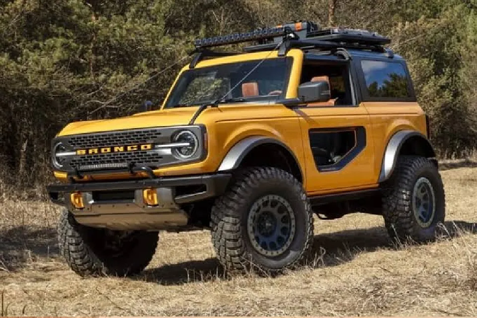 Ford Bronco-style ute concept driving on an outback dirt trail