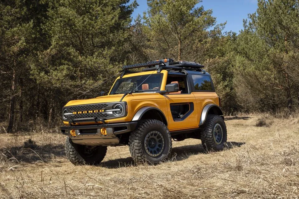 Ford Bronco-style ute concept driving on an outback dirt trail