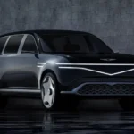 Luxury electric SUV prototype with rear-hinged coach doors open in a showroom