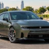 2027 Dodge Charger : Illustration of a muscle car launching at a drag strip