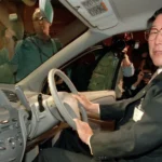 Portrait of former Toyota chairman Hiroshi Okuda, credited as the father of the Prius