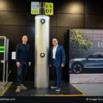 Voltpost Air EV charger mounted on a lamppost outside an apartment building (2)