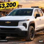 White Chevrolet Silverado EV Work Truck at a US construction job site with contractor tools and $53,200 price badge