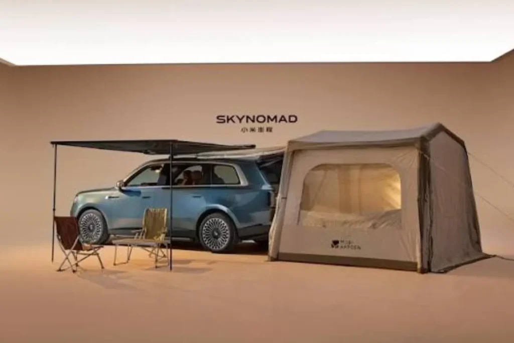 Xiaomi SkyNomad N90 Max Studio with pop-up rooftop tent raised at a campsite