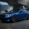 2027 BMW 3 Series sedan front three-quarter profile showing controversial shark nose and aggressive hood design on Autoakhbar.com