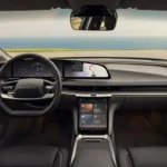 A neat layout matrix displaying pricing eligibility for the Lucid Air UX 3.0 upgrade: 2022 to 2024 requires a nine-hundred-and-fifty-dollar processor hardware upgrade, 2025 and newer receive a free over-the-air update, and 2027 has it as a standard feature